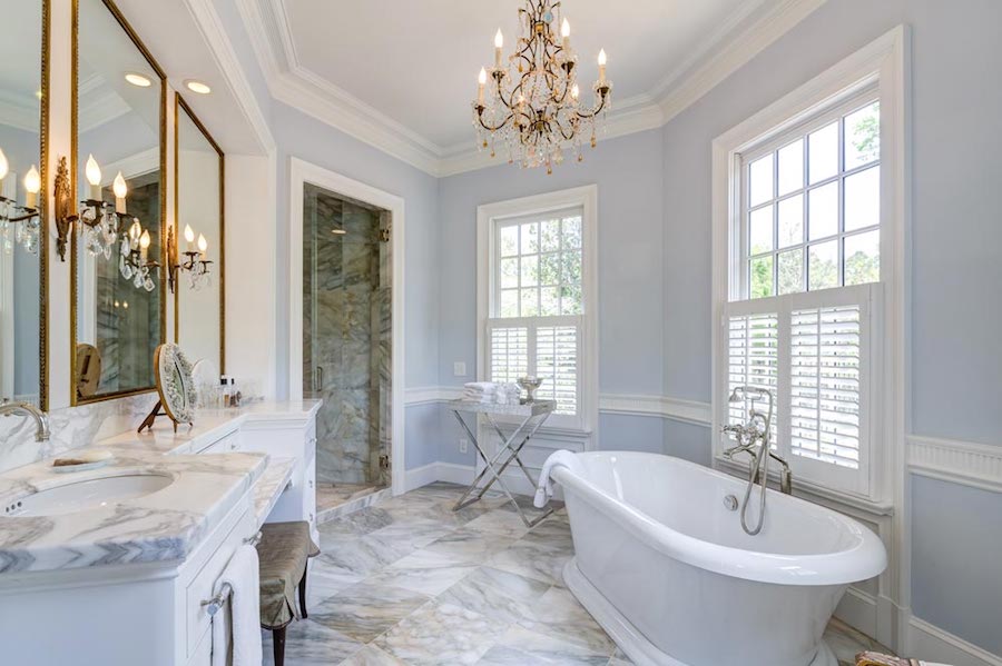 virginia tidewater bathroom renovation with ornate chandeliers