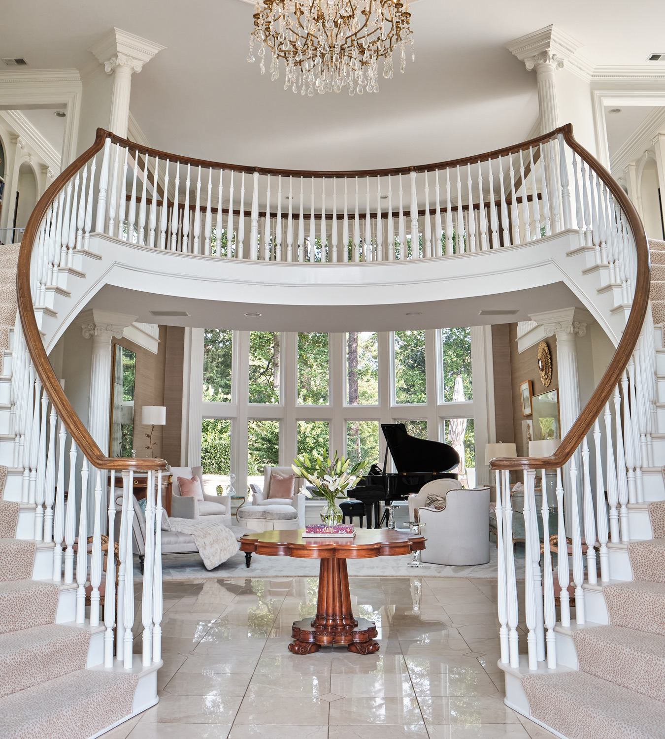 a buffet and small bar in the living room connects to the seating area