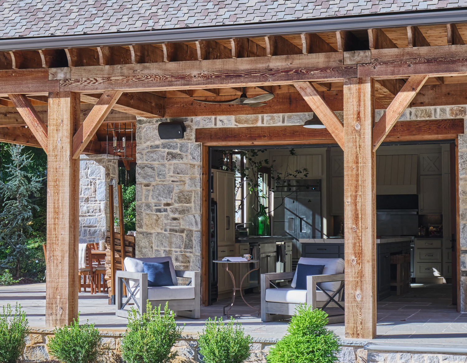 rolled up garage doors feature true indoor outdoor living at the pool house